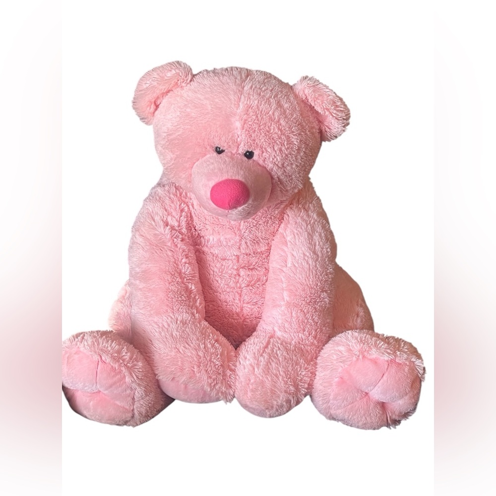 Large light pink plush stuffed animal